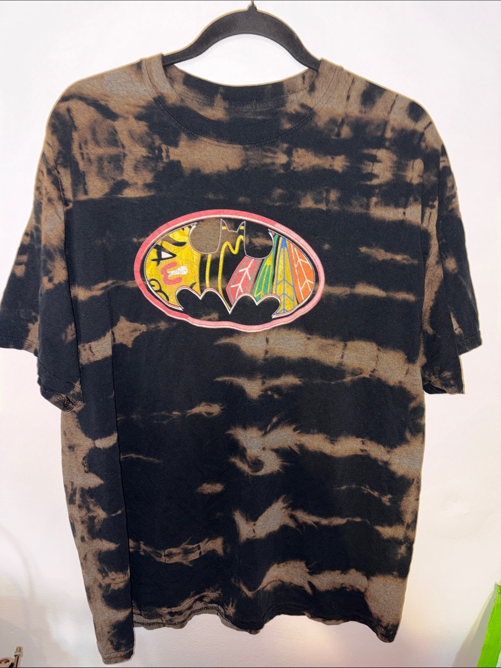 Men's Reverse Tie-Dye Graphic Tee with Colorful Blackhawk Bat Emblem